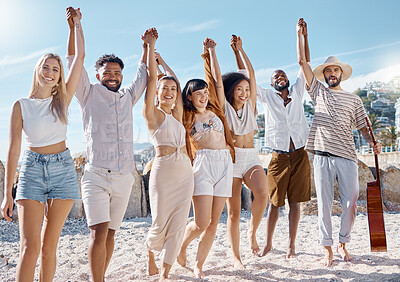 Buy stock photo Shot of a group of friends enjoying their time together at the beach