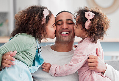 Buy stock photo Shot of two little girls giving their father a kiss on the cheek at home