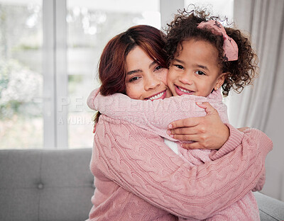 Buy stock photo Happy mother, portrait and hug with child for embrace, love or care and support on sofa at home. Young mom, little girl and daughter smile for bonding, childhood youth or mothersday on couch at house