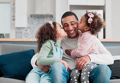 Buy stock photo Shot of two little girls giving their father a kiss on the cheek at home