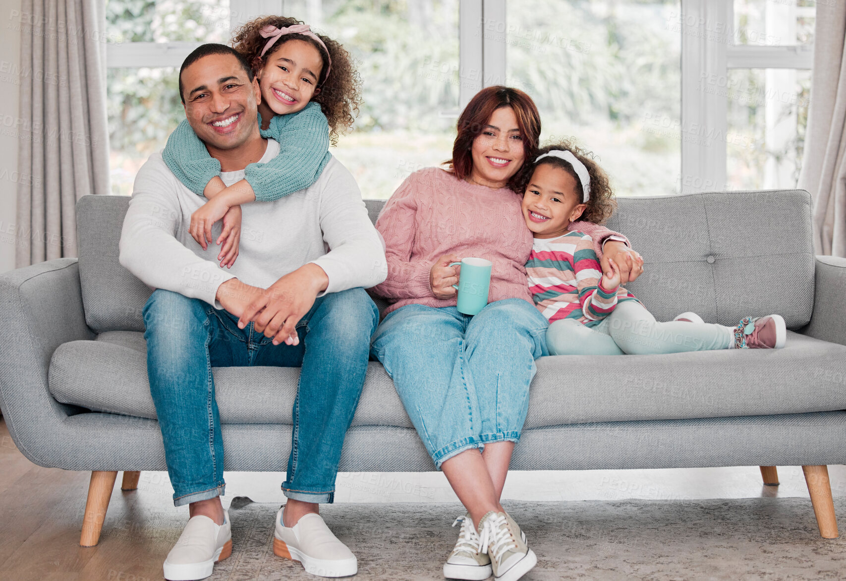 Buy stock photo Parents, girl and happy in home in sofa on portrait for bonding, support and care in Egypt. People, family and smile with kids for break, relax and rest on couch in living room with love or trust