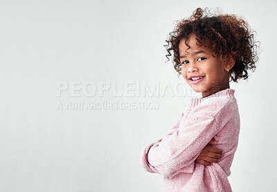 Buy stock photo Portrait, kid and girl with arms crossed, smile and happiness on white studio background. Face, model and child with confidence, pride and mockup space with casual outfit, stylish and clothes