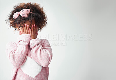 Buy stock photo Girl, white background and covering eyes on pajamas with refusing to prepare for kindergarten. Kid, child and shy in mockup space in morning with waking up for school, education or brain development 