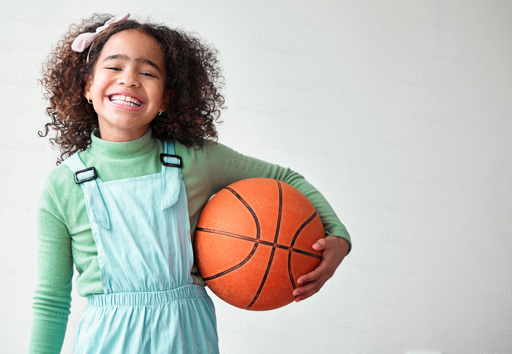 Buy stock photo Kid, girl and happy with basketball in white background with sports for training and fitness in Brazil. Female person, portrait and smile or excited with hobby on mockup space for child development