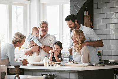 Buy stock photo Big family, love and cooking in home kitchen, bonding or having fun. Support, care and grandparents, father and mother, baby and girl baking, learning and talking while enjoying quality time together