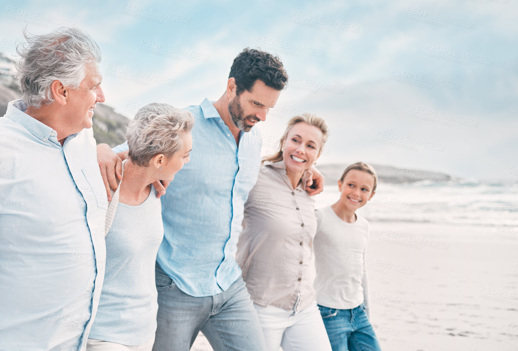 Buy stock photo Happy family, child and grandparents with walk, bonding and travel by ocean for fun or relaxing together. Beach, people and vacation on weekend for adventure, freedom and nature in summer or outdoor