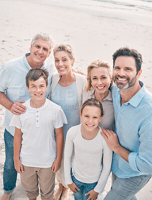 Buy stock photo Shot of a beautiful family taking s selfie at the beach together