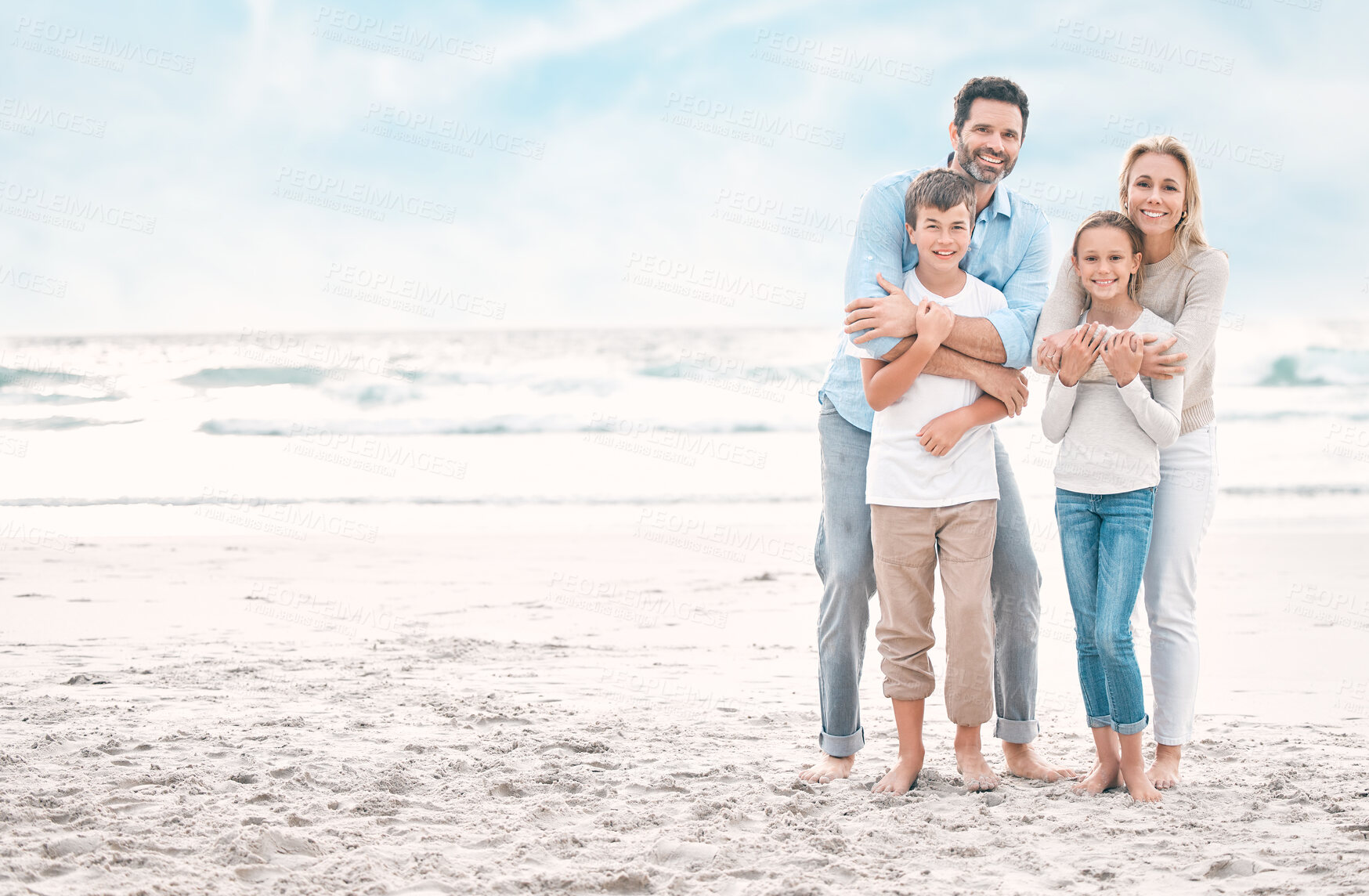 Buy stock photo Hug, portrait and support with happy family on beach together for holiday, travel or vacation. Mockup space, love or smile with mother, father and sibling children outdoor for bonding or wellness