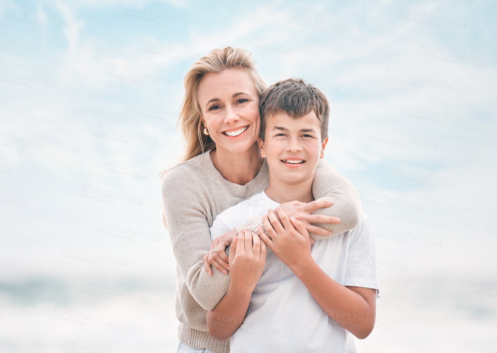 Buy stock photo Portrait, smile and mother with son on beach together for holiday, travel or vacation. Hug, love or support with single parent woman and boy child embracing outdoor for bonding or wellness in summer