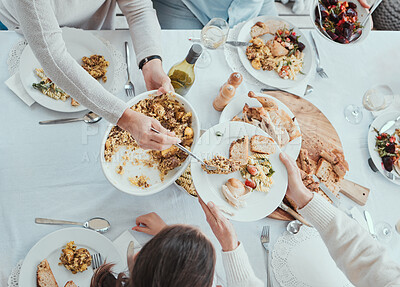 Buy stock photo Shot of a family having lunch on a table at home