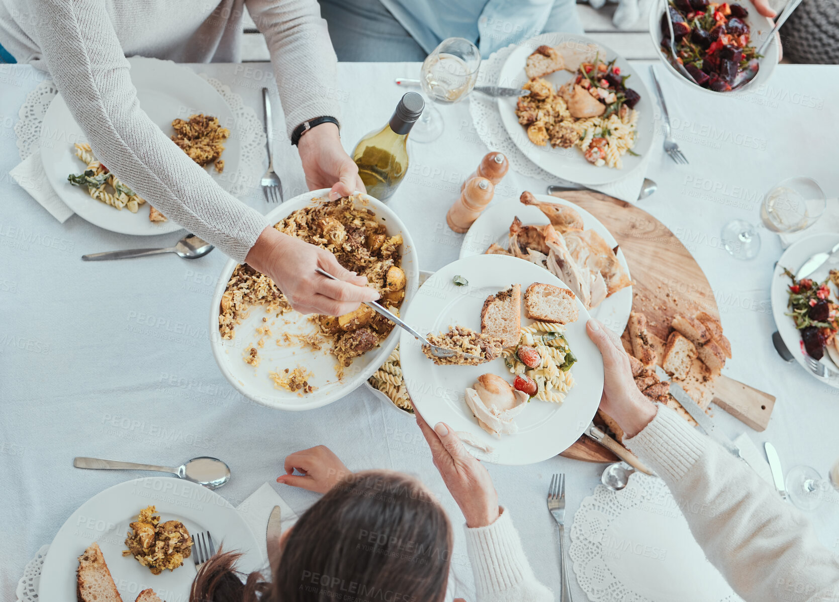 Buy stock photo Shot of a family having lunch on a table at home