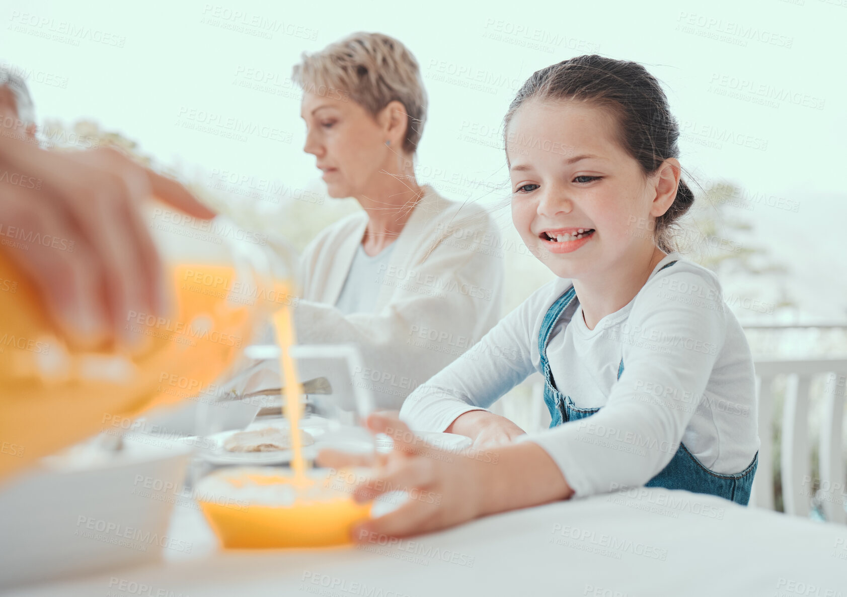 Buy stock photo Hand, child and juice in eating lunch or meal for thanksgiving, celebration and event. Female person, happy and joy with food, table and nutrition for healthy diet, feast and festive holiday in home