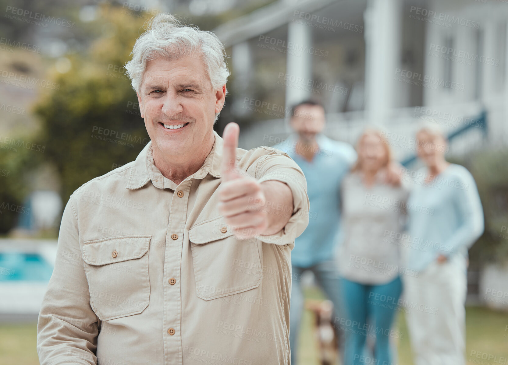 Buy stock photo Shot of a mature man showing a thumbs up in the garden at home