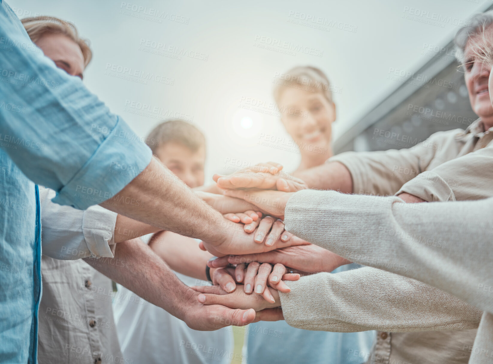 Buy stock photo Celebration, hands and success with family in garden of new home together for property investment. Huddle, motivation or support with senior people, parents and kids outdoor for real estate growth