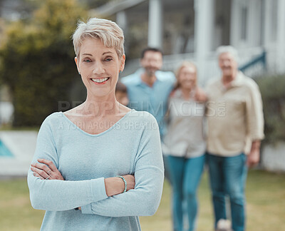 Buy stock photo Senior woman, confidence and portrait at backyard with family to relax outdoor together. Face, arms crossed and happy mature person by house with grandmother in retirement with people or children