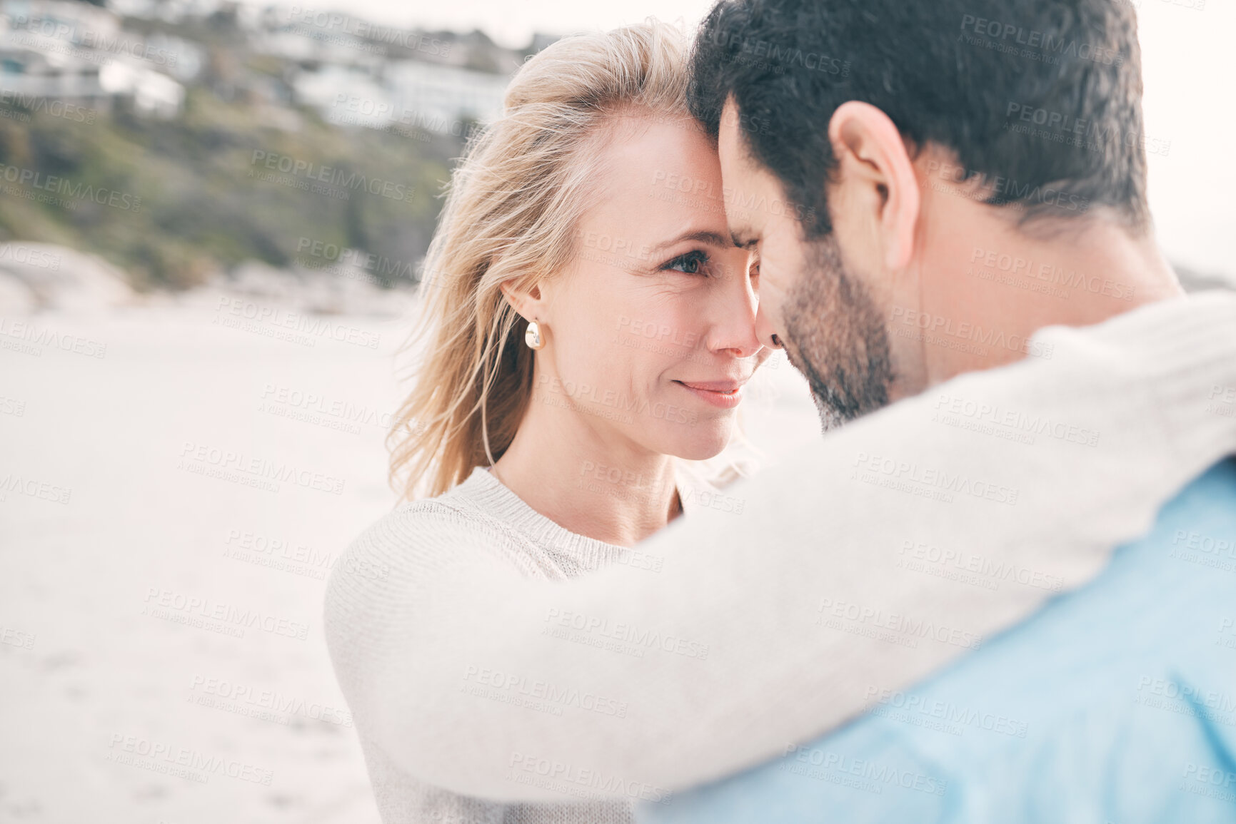 Buy stock photo Beach, love and couple touching face on holiday, vacation and romantic weekend for anniversary. Intimacy, marriage and happy mature man hugging woman for bonding, quality time and happiness by ocean