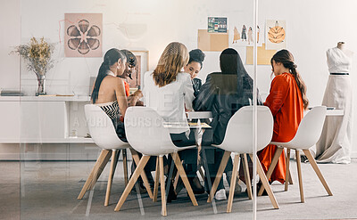 Buy stock photo Shot of a group of businesswomen in a meeting at work