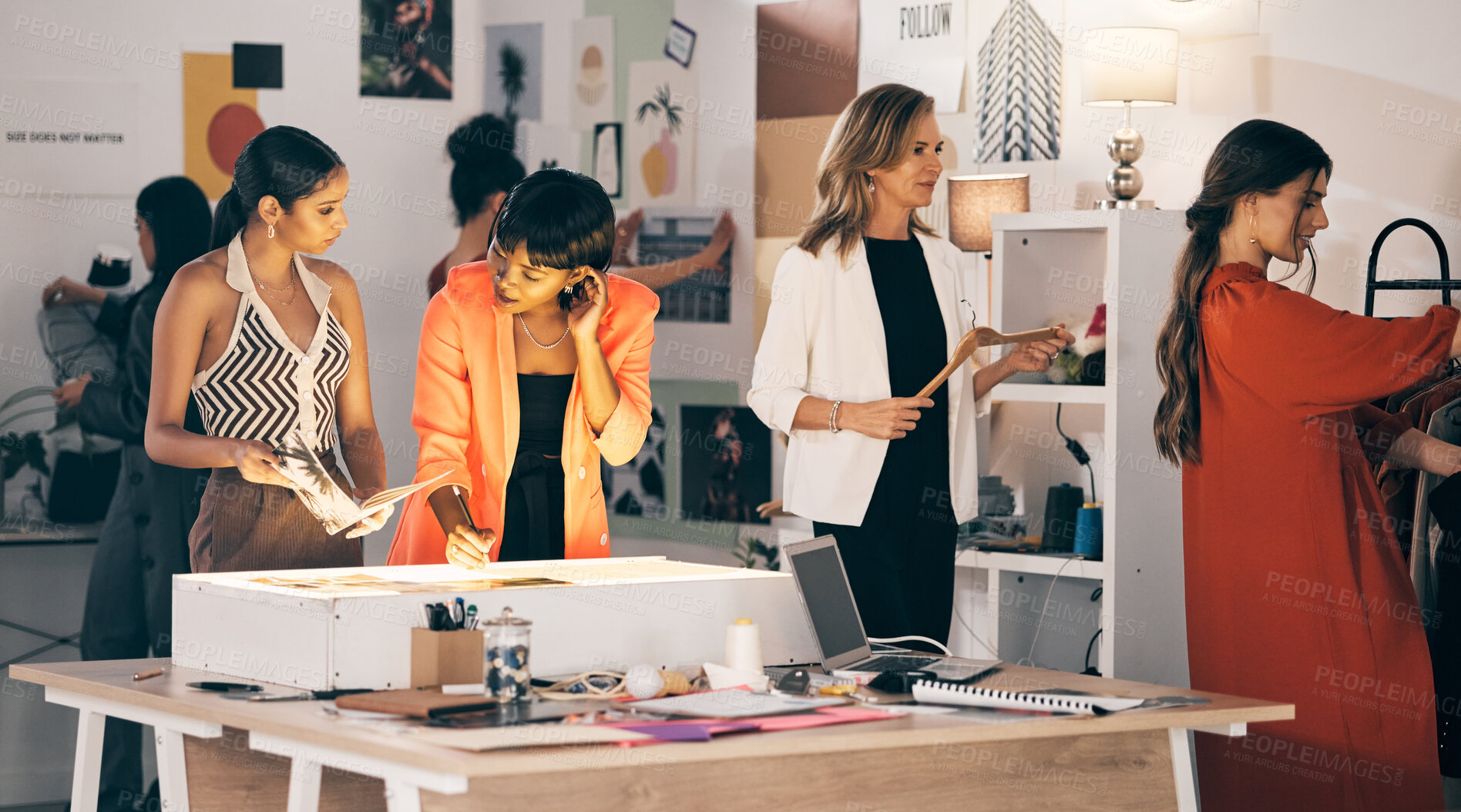 Buy stock photo Shot of a group of designers collaborating at a workshop together