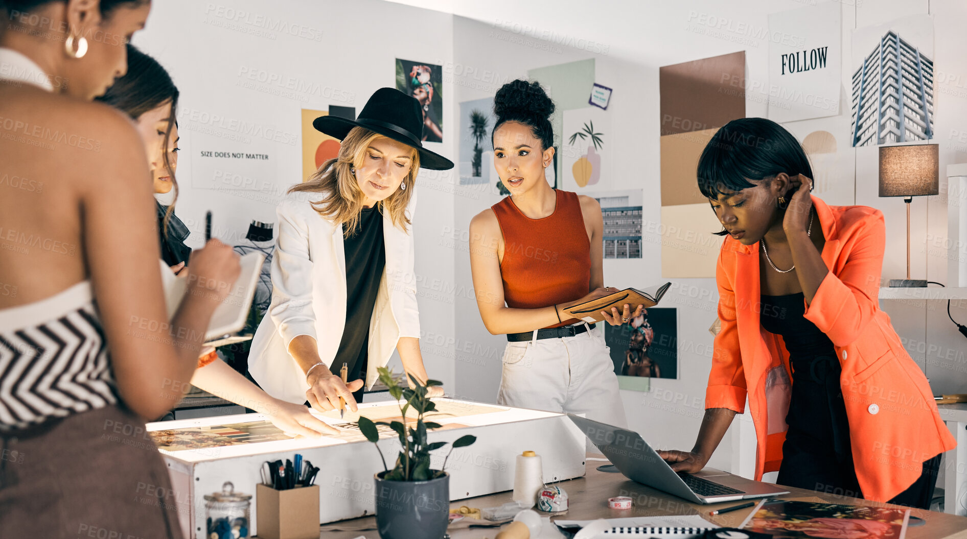 Buy stock photo Creative business, people or brainstorming in workshop for design, advice or discussion at light box. Fashion designers, team or planning on paper for creativity, startup growth or ideas for clothing