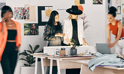 Buy stock photo Shot of a group of designers collaborating at a workshop together