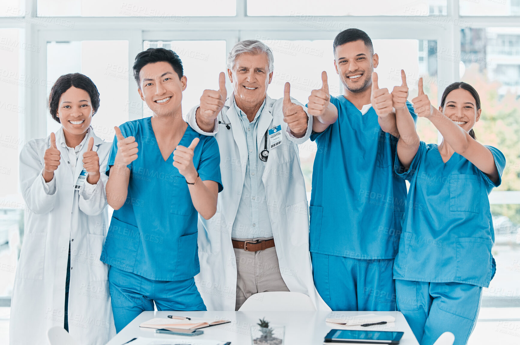 Buy stock photo Portrait, doctors or nurses with thumbs up in clinic, support or about us with breakthrough. Face, people or men with women, employees or hand gesture for agreement, motivation or results in hospital