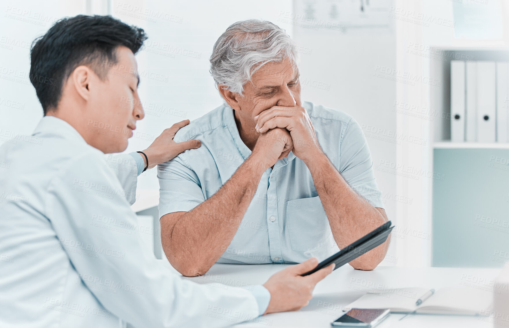 Buy stock photo Sad, men and doctor with patient on tablet at office on consultation with feedback on diagnosis. People, medical professional and mature person at clinic for bad news, results and support or care