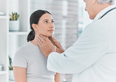 Buy stock photo Shot of a doctor checking a patients glands for swelling