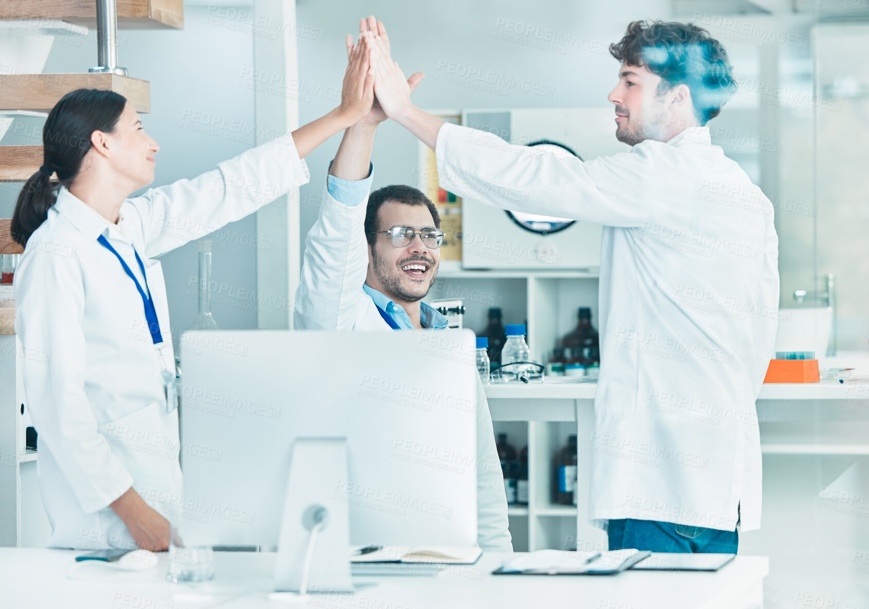 Buy stock photo Laboratory, computer and doctors with high five for support, celebration and success of medical research. Healthcare, teamwork and people as scientist with hand gesture, motivation and science goal