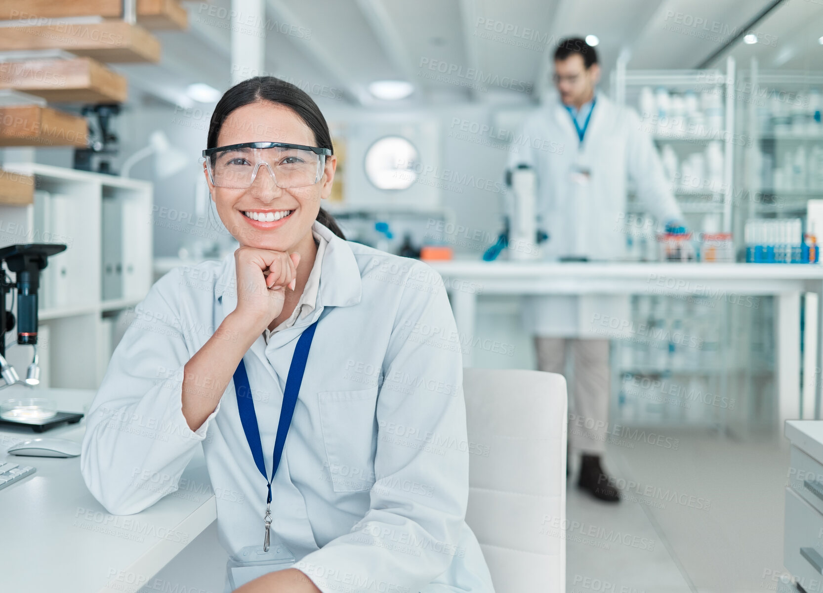 Buy stock photo Happy woman, portrait and scientist with goggles at laboratory for medical science or microbiology. Young, female person or biologist with smile for job or career in scientific forensics at lab desk 