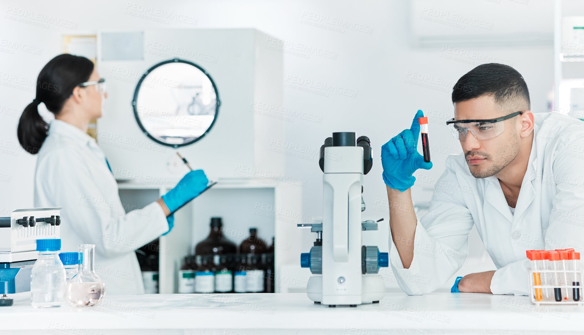 Buy stock photo Blood test, man and scientist in laboratory for science breakthrough, clinical trial and discovery. Biotechnology, medical results and vaccine research with sample tubes for mpox cure development