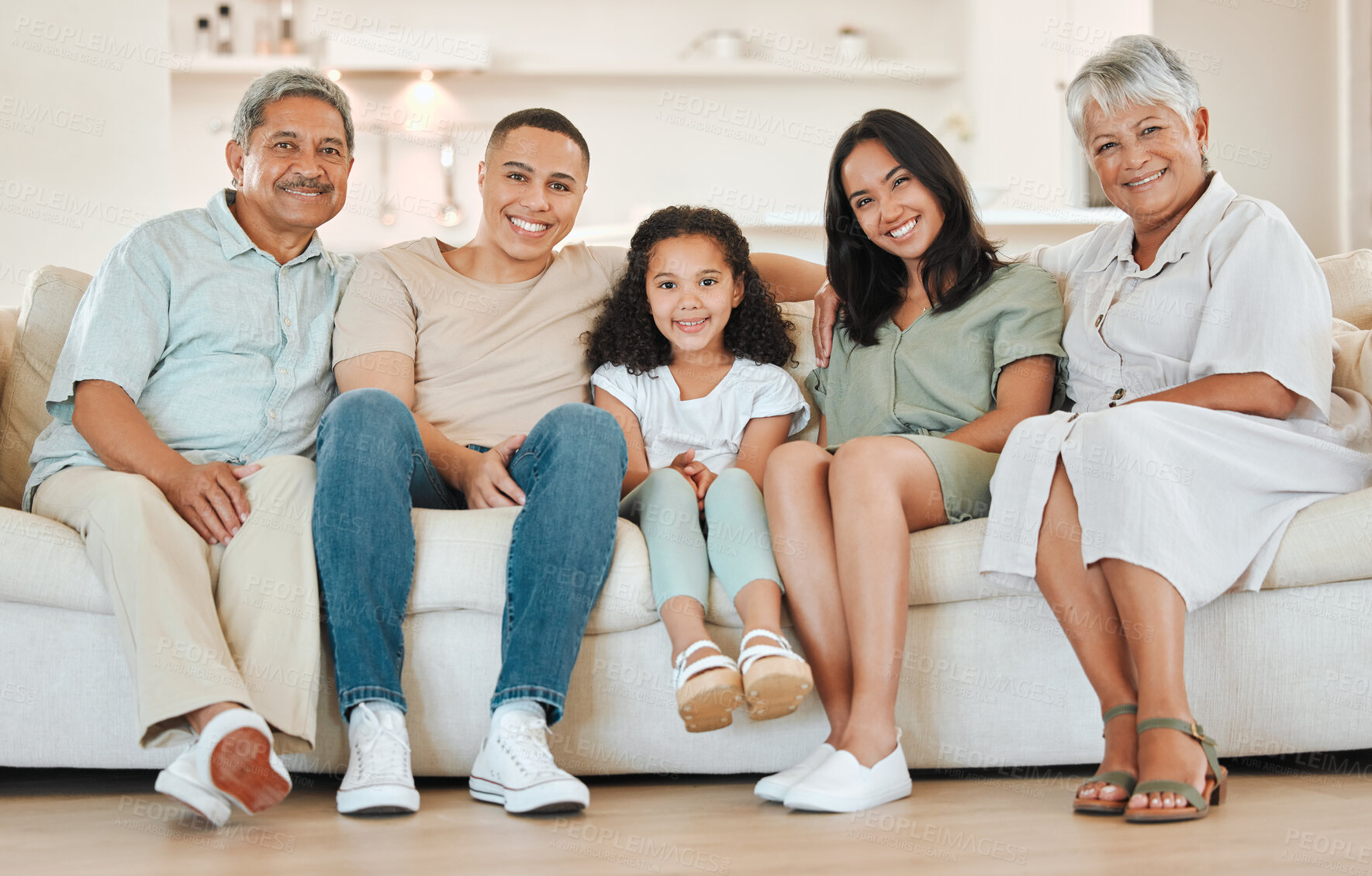 Buy stock photo Happy, hug and portrait of child with grandparents on sofa for bonding, connection or care in home. Smile, love and girl kid embracing senior man and woman in living room of family house in Mexico.