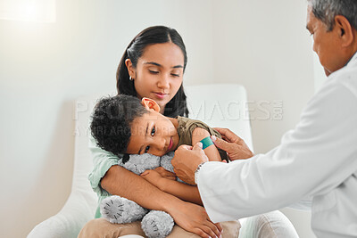 Buy stock photo Pediatrician, woman and child with bandage plaster and vaccine for growth or development in clinic. Mother, boy and doctor with comfort at hospital for immunity, routine checkup or illness prevention