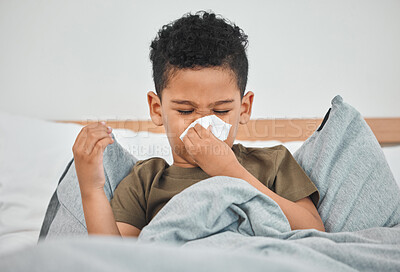 Buy stock photo Sick, blowing nose and child in bed with allergy, cold fever and covid virus in home. Tissue paper, boy and kid sneezing with flu infection, bacteria sinusitis and medical health problem in bedroom