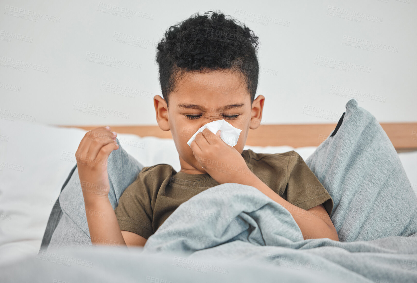 Buy stock photo Sick, blowing nose and child in bed with allergy, cold fever and covid virus in home. Tissue paper, boy and kid sneezing with flu infection, bacteria sinusitis and medical health problem in bedroom