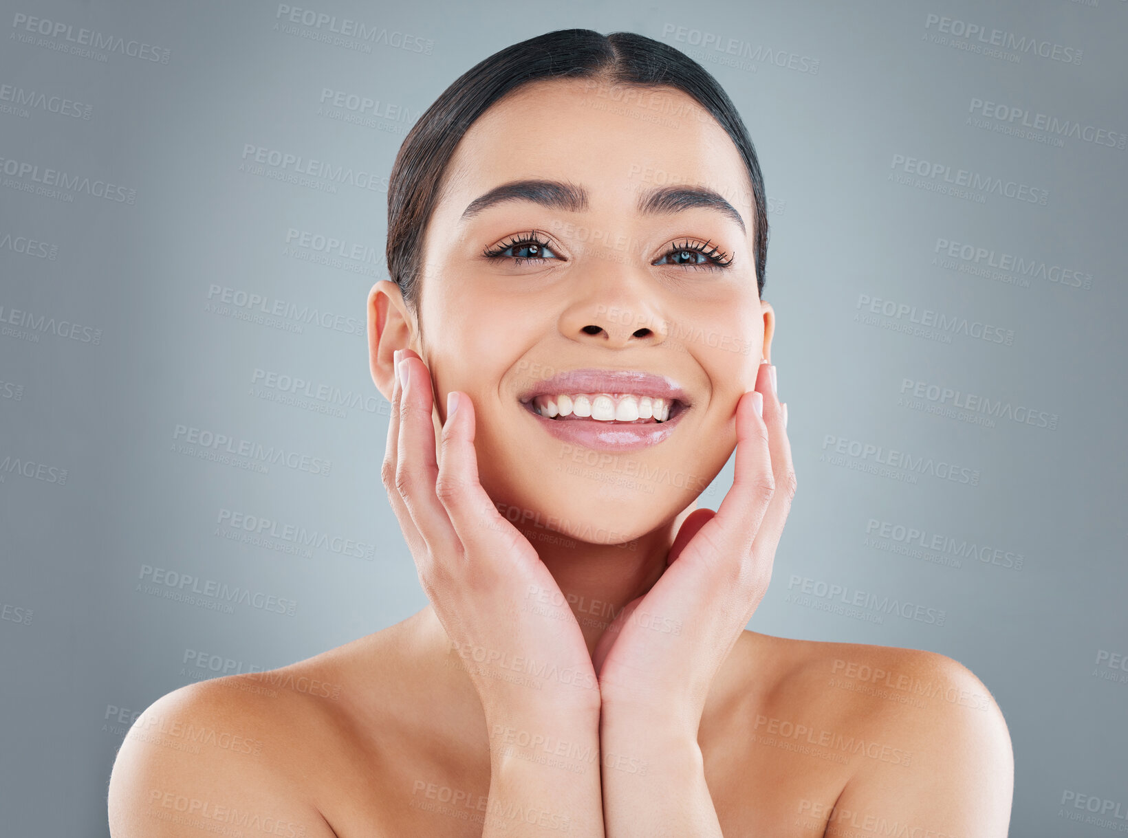 Buy stock photo Portrait, skincare and woman in studio with smile for cosmetics, dermatology or glowing skin on gray background. Spa, wellness and hands of model for satisfaction, clean or fresh treatment on mockup