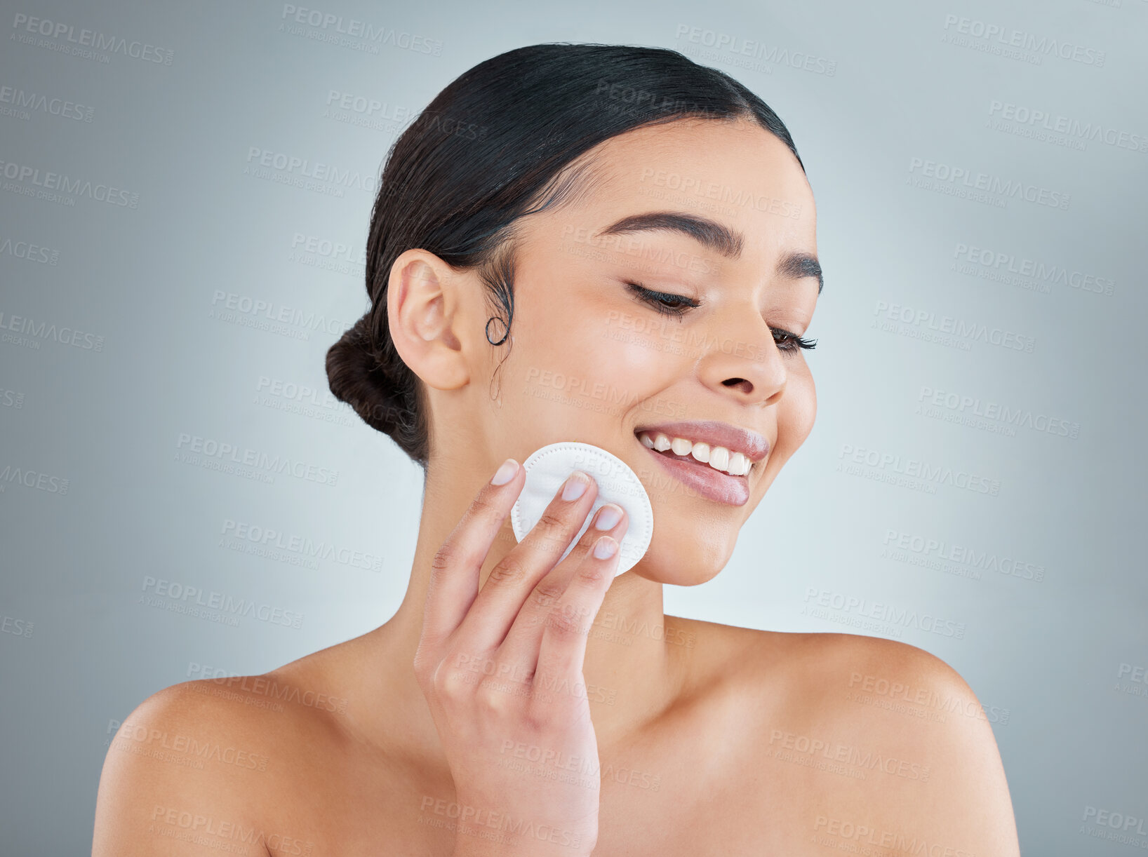 Buy stock photo Face, skincare or happy woman with cotton pad for beauty, wellness or healthy facial grooming routine. Studio background, natural or person cleaning with swab for results, cleansing or dirt removal