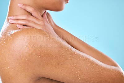 Buy stock photo Studio shot of a woman posing with water droplets on her skin