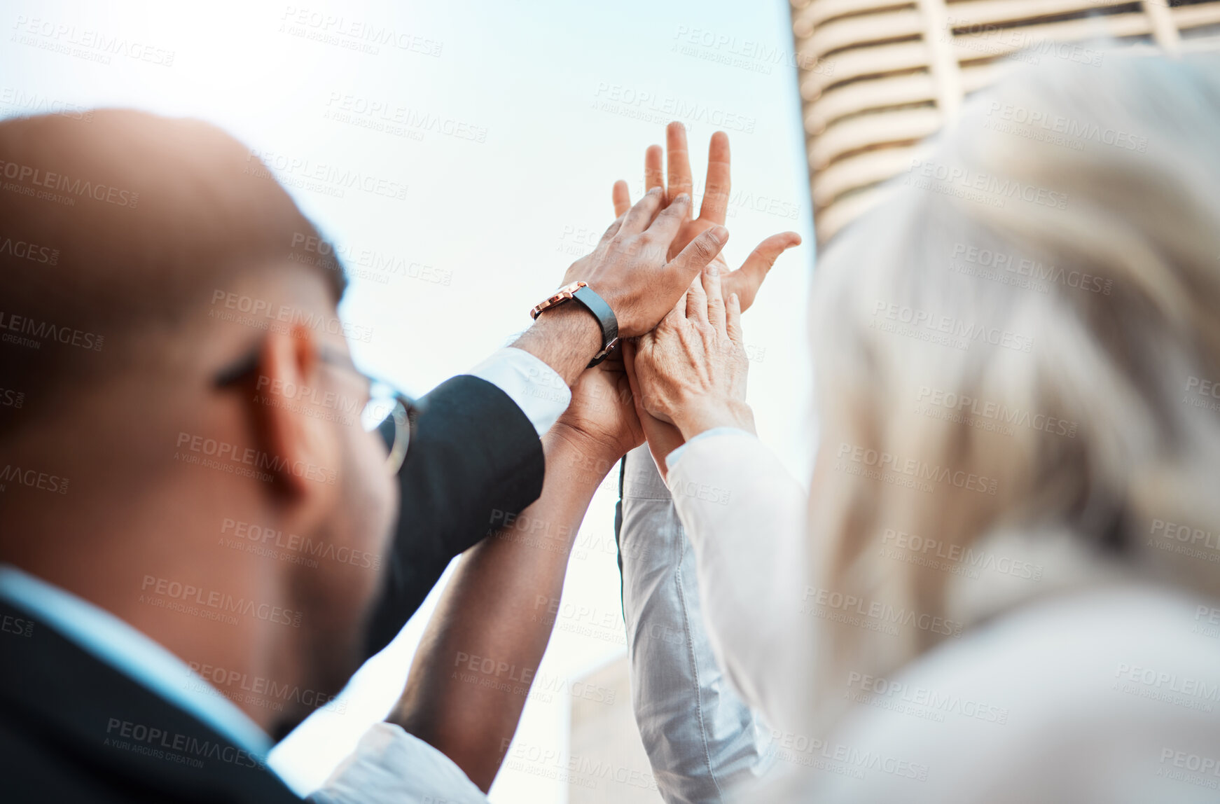 Buy stock photo Victory, high five and collaboration of group, outdoor and solidarity for business, celebration and unity. Sky, friends and  success for team, achievement and hands for accomplishment, win and people