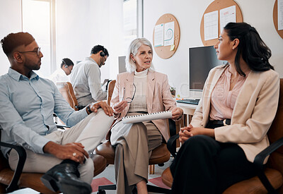 Buy stock photo .Shot of a diverse group of businesspeople sitting in the office together and having a discussion