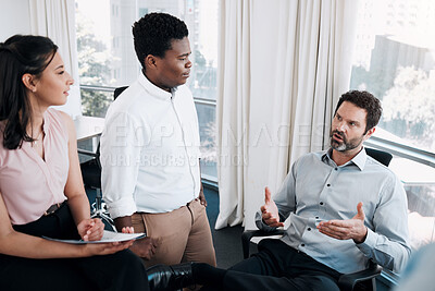 Buy stock photo Meeting, people and talk in office for planning, brainstorming and feedback for learning. Man manager, interns and advice in agency for project development, onboarding discussion or share information