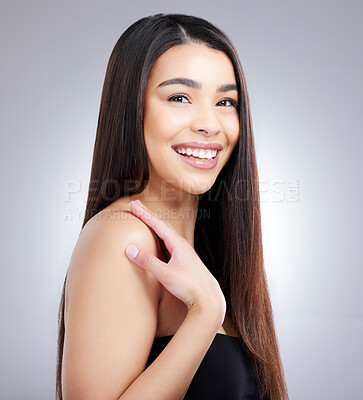 Buy stock photo Beauty, portrait and smile woman with hair in studio for healthy growth, keratin treatment or straight hairstyle aesthetic. Female person, wellness and collagen shine, cosmetics and white background