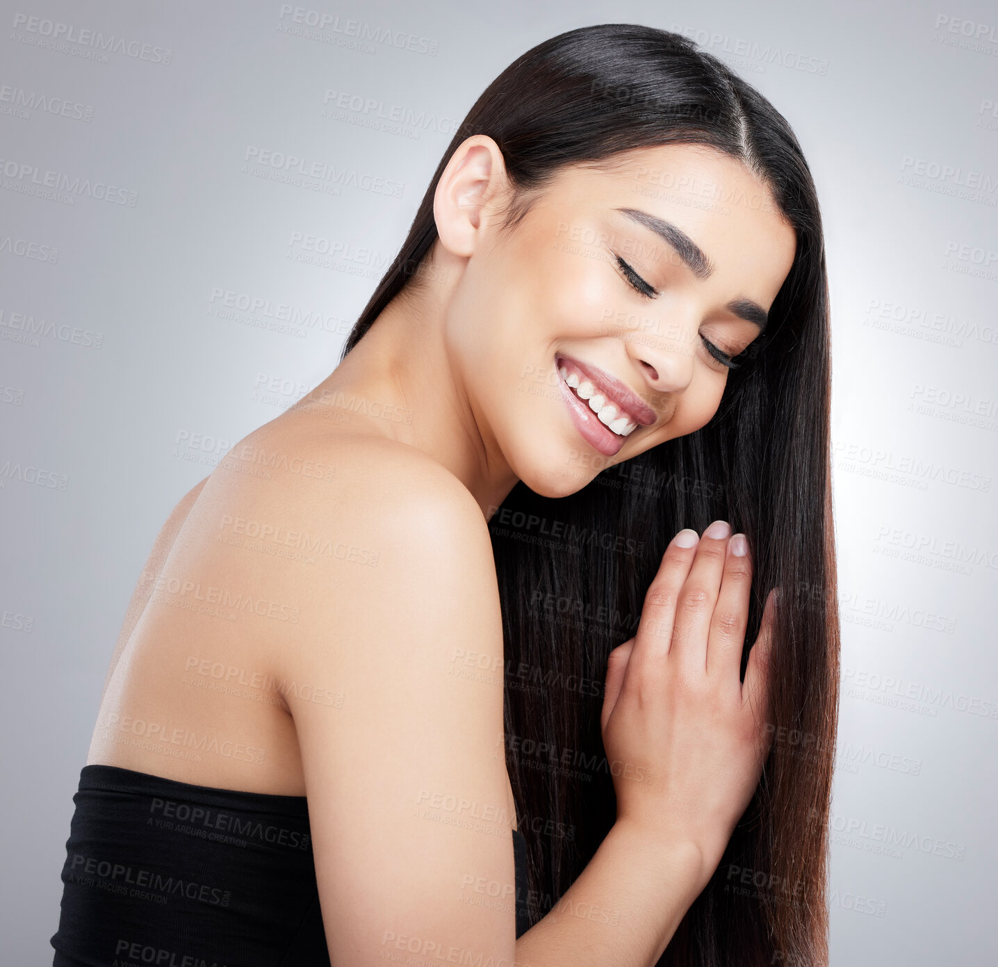 Buy stock photo Smile, woman and eyes closed for haircare beauty in studio for healthy growth, keratin treatment or hairstyle aesthetic. Female person, wellness and collagen shine, cosmetics and white background

