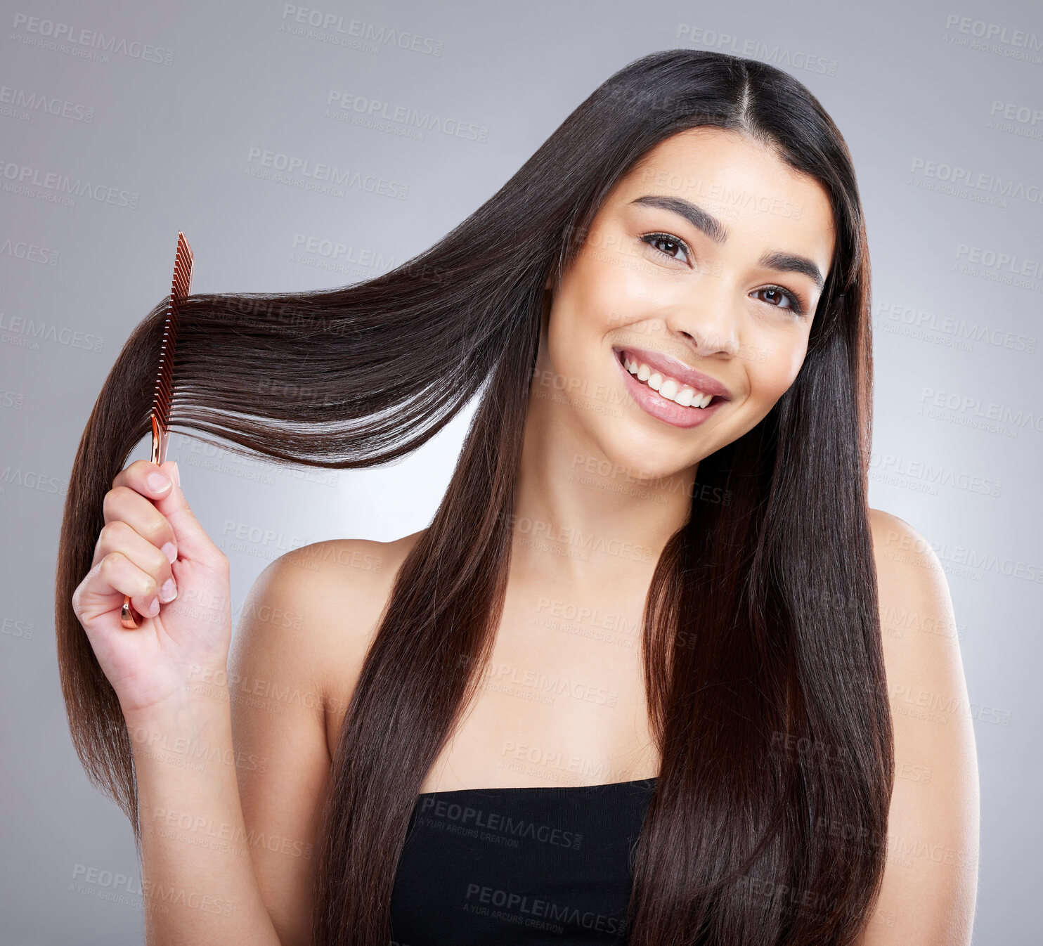 Buy stock photo Hair care, portrait smile and woman with comb for salon aesthetic and healthy scalp for growth in studio. Model girl, keratin texture and beauty tool for detangling with grooming by grey background