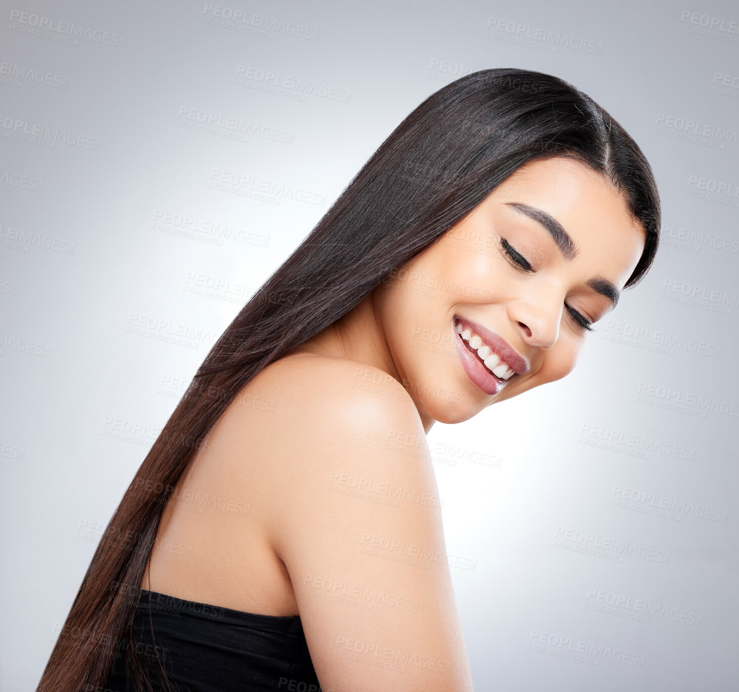 Buy stock photo Girl, calm and smile in studio for hair care with peace, natural makeup and organic cosmetics for healthy straight growth. Woman, eyes closed and salon repair on grey background, isolated and keratin