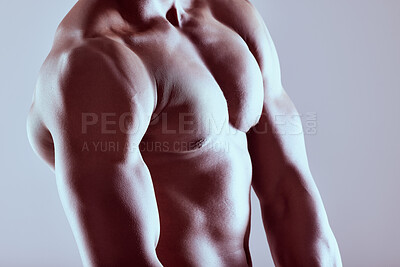 Buy stock photo Shot of an unrecognizable  muscular man posing nude against a grey background