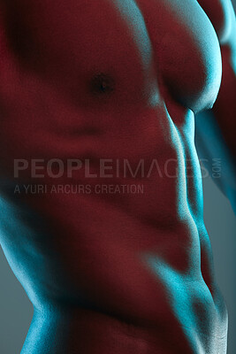 Buy stock photo Shot of an unrecognizable  muscular man posing nude against a grey background