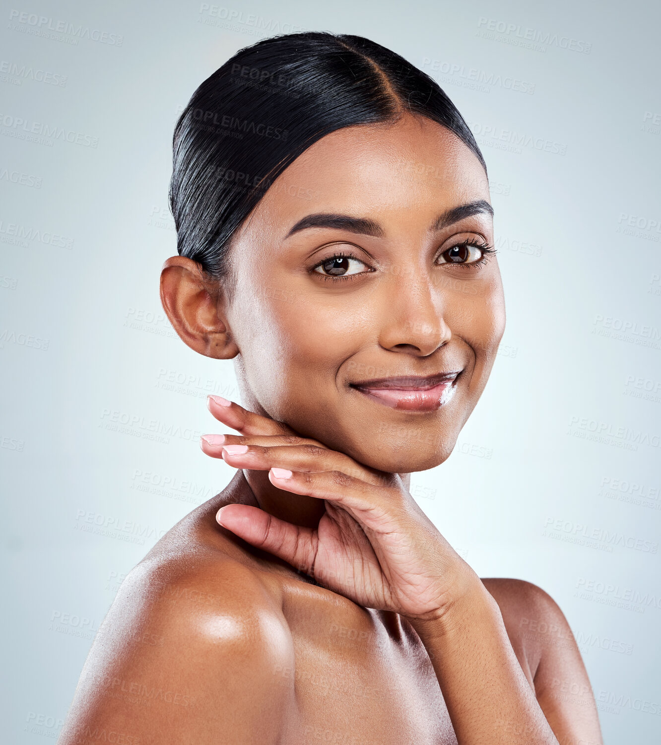 Buy stock photo Smile, beauty and Indian woman or model with skincare cosmetic isolated in a studio white background. Clean, natural and portrait of female person hand on her face happy for self love or care