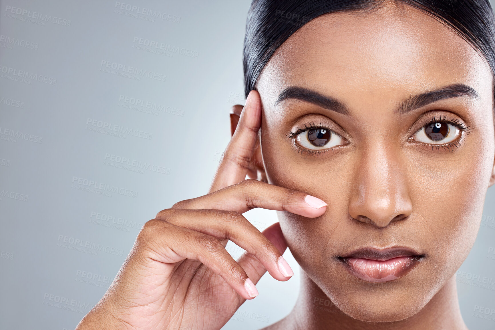 Buy stock photo Portrait, woman and thinking in studio for skincare, beauty and cosmetics in morning. Girl, model and face for mockup space and idea with hand, cosmetics and pride for grooming by grey background