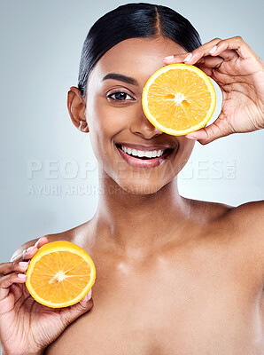 Buy stock photo Indian woman, orange and smile for organic beauty, hand and fruit on white background. Citrus, food or vitamin c for hydrated skin or body care, studio and vegan skincare with happy female person