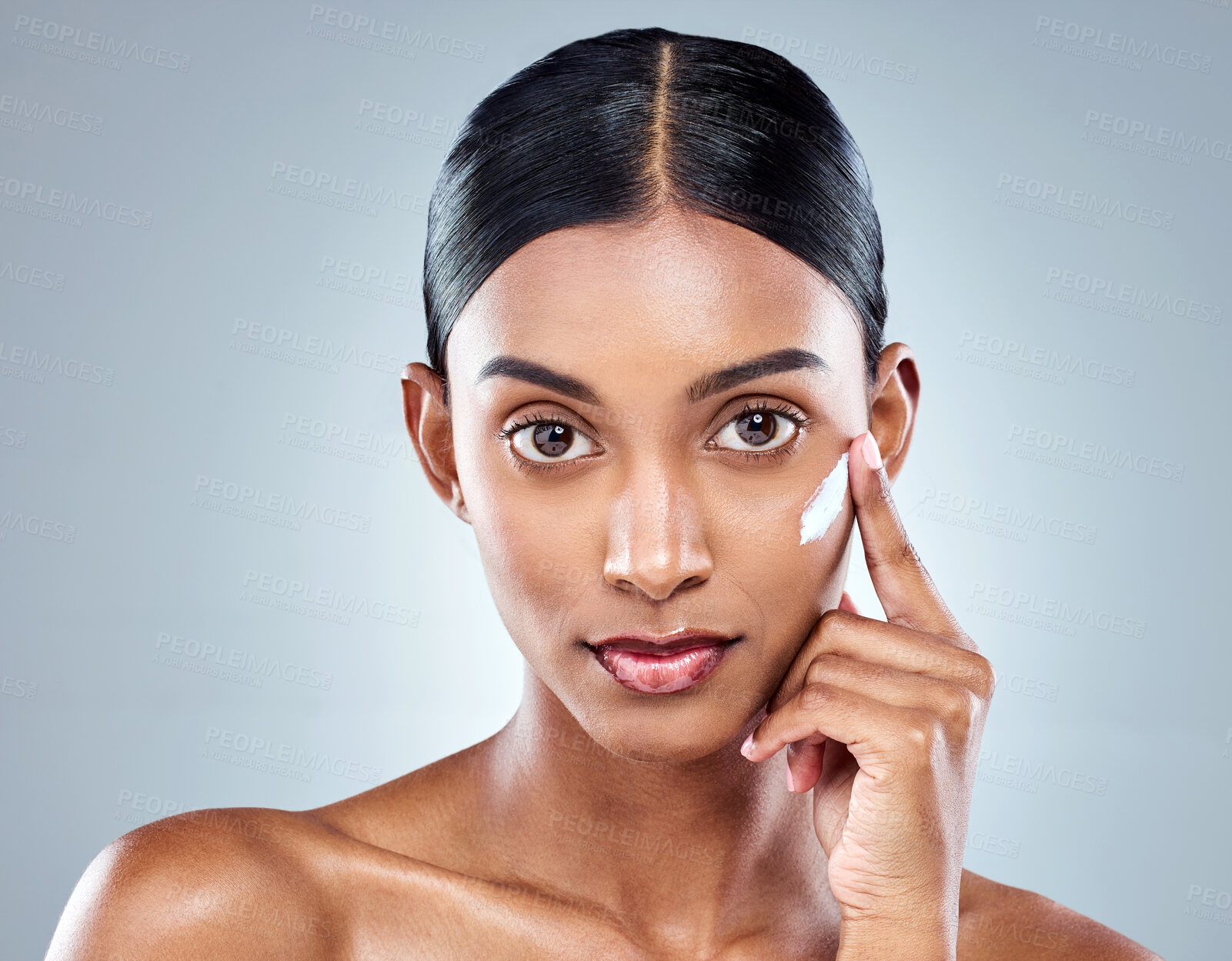 Buy stock photo Skincare, cream and portrait of woman in studio with moisturizer for dermatology, wellness or facial treatment on gray background. Beauty, hand and model for cosmetics product, lotion or sunscreen